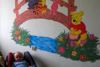 Pokój dla mojego synka Krzysia miał być kolorowy, dlatego namalowałam postacie bajkowe ;)