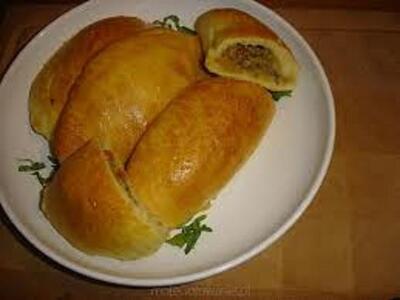 Pierogi drożdżowe z rybą .